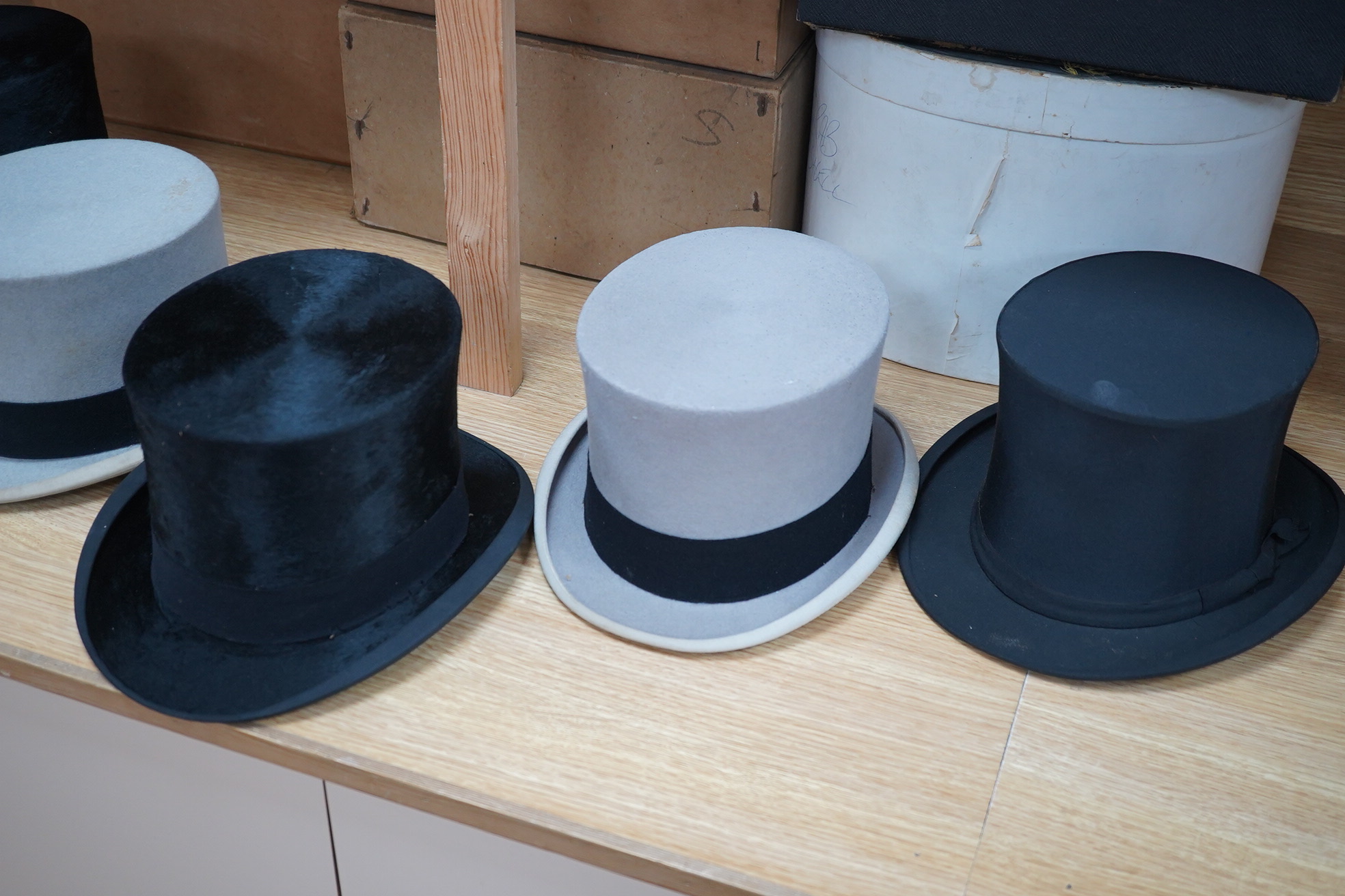 A group of five assorted top and bowler hats, boxed. Condition- varies